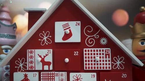 Wooden Tree Advent Calendar Decorated and Nutcracker Soldier Toys With Bokeh Blured BackgrWooden Tre