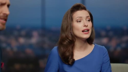 Closeup Smiling Host Speaking with Male Guest in Live Talk Show Close Up