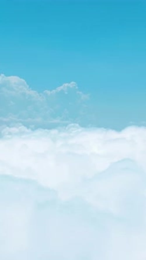 Vertical Video Stunning Mountain Views With Floating Clouds Green Forests and Clear Blue Skies for a