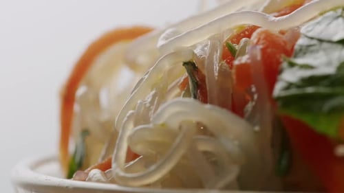 Glass Noodles Salad with Meat and Carrots Fermented Close Up Asian Chinese Traditional Food