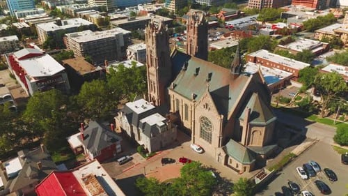Magnificent building of Madeleine Cathedral among the urban architecture.