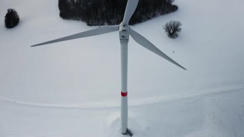 Panoramic View of a Wind Turbine Park in the Winter Field As a Hub of Renewable Energy Production