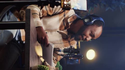 Man Recording Podcast at Home Studio