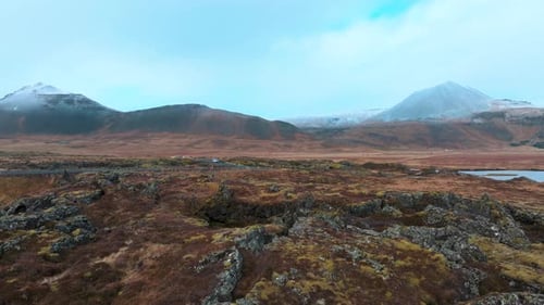Car Drives Through Breathtaking Mountainous Landscape