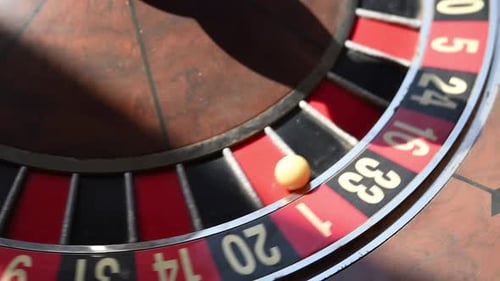 A Closeup View of a Vintage Roulette Wheel the Ball Resting in a Slot Capturing the Timeless Allure