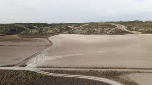 Drone Footage of Dry Meadow and Dirt Road in Rural Spanish Area