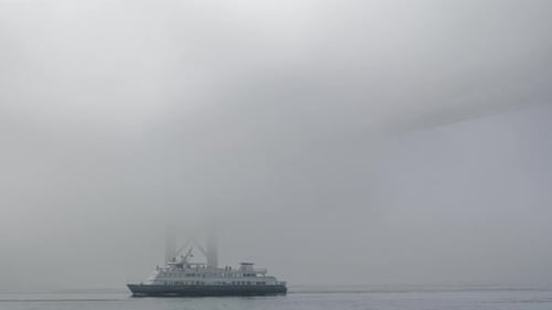 Timelapse of April 25Th Bridge in Dense Fog Over Tagus River Lisbon Portugal