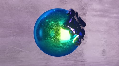 Die blaugrüne glänzende Kugel wirft ihre Schale ab und verwandelt sich in ein transparentes flüssiges Objekt