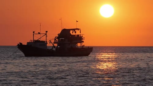 View at Fishing Boat at Sunset Time