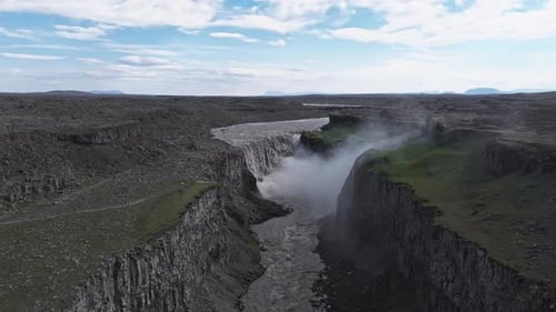 Aerial View of Dettifoss Waterfall Cascading Into a Deep Canyon