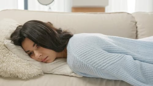 Young beautiful blonde woman sleeping in her bedroom By Dash