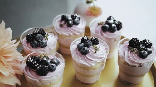 Candy Bar Wedding Candy Buffet Tasty Small Cheesecake with Blueberries and Blackberry Closeup