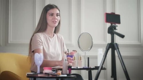 Young Woman Recording Beauty Vlog at Home
