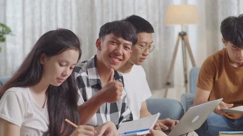 Group of Students Studying Together in a Living Room