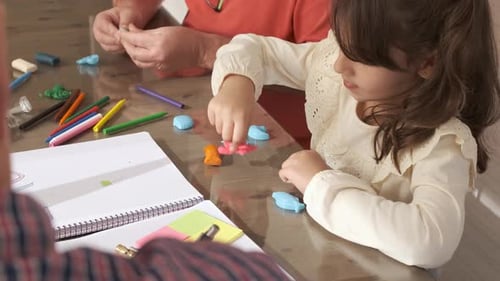 Child Crafts With Clay With Family Indoors