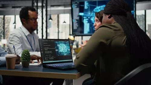 System Administrators in Startup Office Brainstorming Leverage AI Tech