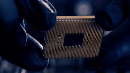 Computer Repairman Holding Pc Processor