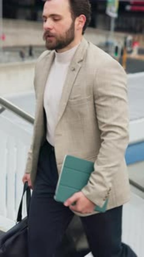 Businessman, walking and commute in city with bag, tablet and check watch for real estate