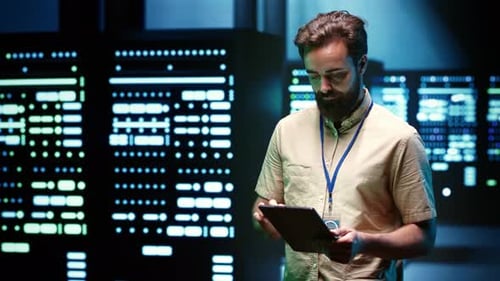 Engineer Inspecting High Performance Servers for Scientific Computing