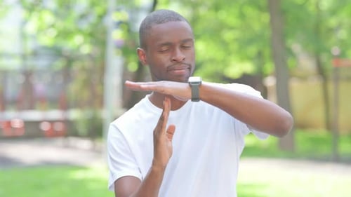 Time out Gesture by Young African Man Outdoor