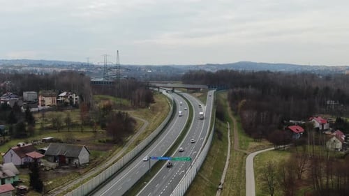 Modern Infrastructure: A4 Highway Cutting Through a Hilly Landscape in Krakow Poland
