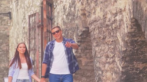 Couple of Tourists Traveling and Exploring Beautiful Old Town Loving Man and Woman in a Vacation