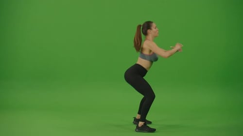 Young Woman Doing Squats and Lunges