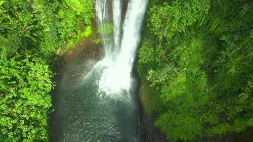 Aerial Drone View of Beautiful Aling Aling Waterfall in Nothern Bali Indonesia