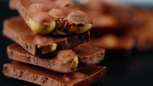 Delicious Milk Chocolate with Hazelnuts Close Up