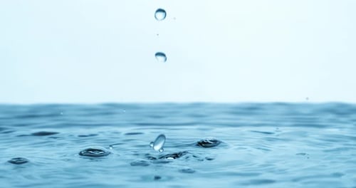 Water Drops close-up of water falls in a super slow motion. Shot on super slow motion camera 1600