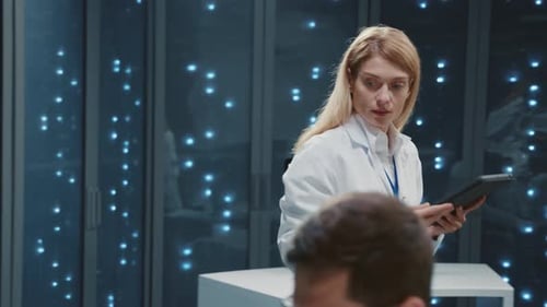 Data Scientists Collaborating in Modern Server Room