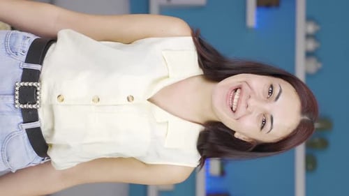 Smiling Woman Talking in Vertical Video