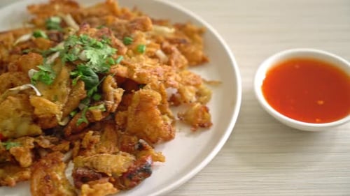 Crispy fried mussel pancake with egg - Thai street food style