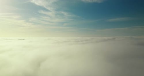 Aerial View of Clouds Floating Under Blue Sky