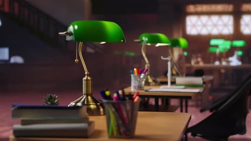 Peaceful Empty Library Featuring Wooden Shelves and Vintage Green Lamps