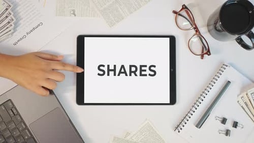 SHARES DISPLAYING ON A TABLET SCREEN