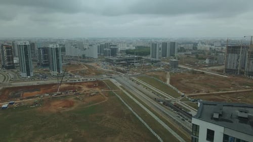 Construction site of a new city block. Construction of multi-storey buildings.