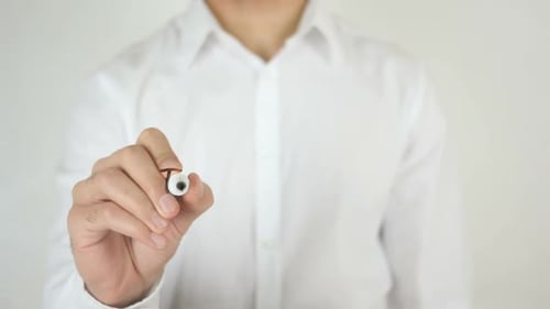 Writing Tax Time Deadline on Clear Surface