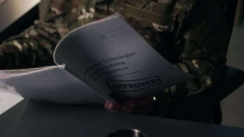 Officer Checking Document Working at Military Office