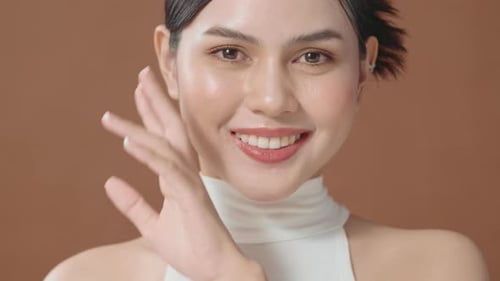 Close Up Of Smiling Woman Posing For Camera