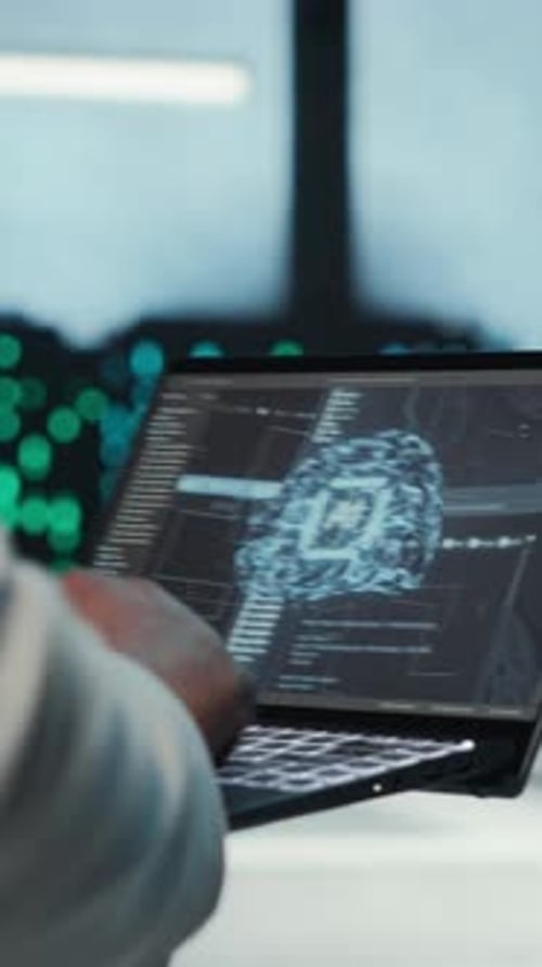 Vertical Video Server Room System Administrator Using Laptop to Do AI Automatization