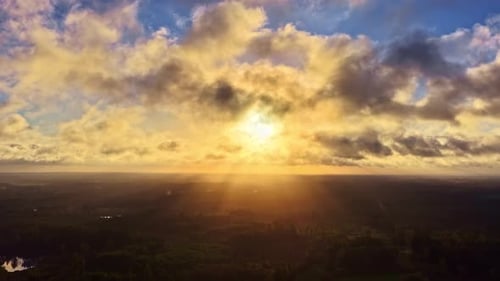 Stunning Time-Lapse of Sunrise Over Cloud-Filled Sky in Peaceful Dawn Light