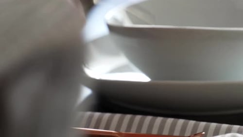 Cleaning Up Dining Table with Forks and Knives Close Up in Fine Dining Restaurant with Napkin and Em