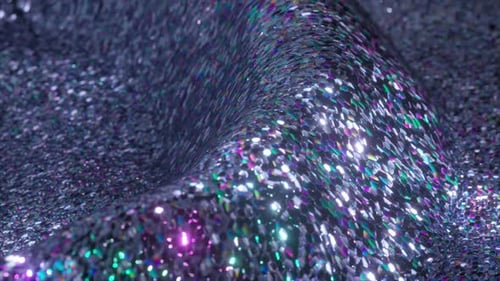 Le tissu argenté scintillant avec des paillettes irisées s'ondule lentement pour créer de beaux reflets et
