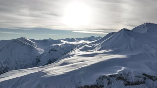 Aerial view of beautiful snowy mountains in Gudauri, Georgia