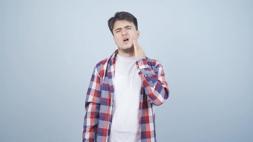 Man with toothache.