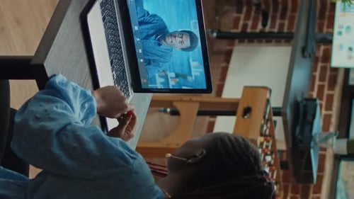 Woman in Video Call With Man on Laptop