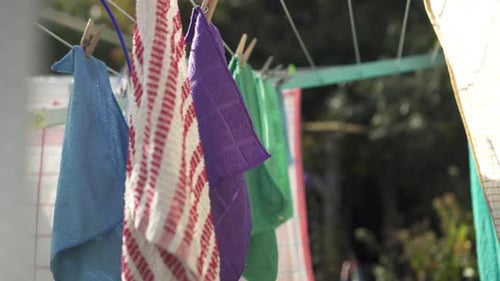 Colorful Towels Drying on an Outdoor Clothesline