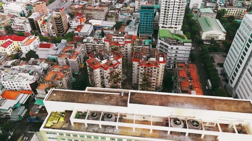 Discover the charming allure of Ho Chi City's vintage apartment buildings in this captivating aerial