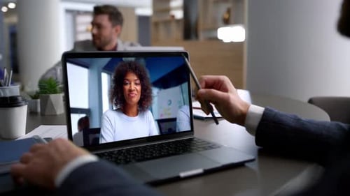 Woman Talking Virtual Chat at Laptop Screen in Company Coworking Office Close Up
